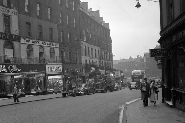 Looking down Leith Street in Edinburgh towards Picardy Place in 1958. Picture shows (left hand side) the Top Deck restaurant, John Collier menswear and Timpson's shoe shop. All these shops were demolished to make way for St James Centre and King James Hotel in 1969.