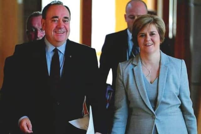 Nicola Sturgeon and Alex Salmond were close in the past. (Picture: PA)