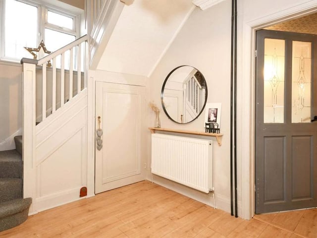 The entrance hallway is as polished as the rest of the property. As you can see, it brings us out of the living area and guides us upstairs to the bedrooms.