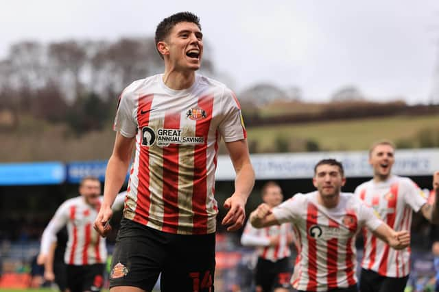 Rangers are reportedly interested in Sunderland striker Ross Stewart (centre).