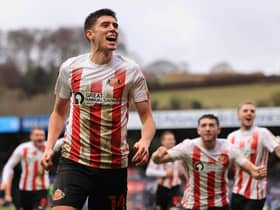 Rangers are reportedly interested in Sunderland striker Ross Stewart (centre).