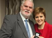 Stuart Pratt with First Minister Nicola Sturgeon at an event in 2017 to mark his service as a local councillor.