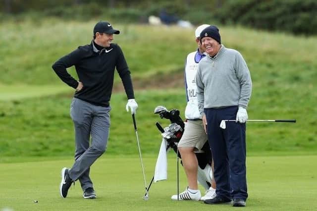 Rory McIlroy shares a laugh with dad Gerry during their last appearance in the Alfred Dunhill Links Championship in 2019.