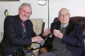 RAF captain John Cruickshank VC (right) who, at the age of 103, has been presented with the Air Efficiency Award, after a 75-year wait. Photo: Group Captain Bob Kemp/PA Wire