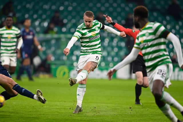 Leigh Griffiths scores to the opener at Celtic Park. (Photo by Rob Casey / SNS Group)