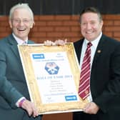 Davie Wilson (left) and alongside Hearts legend John Robertson after being inducted into the Scottish Football Hall of Fame in 2014. Picture: SNS