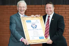 Davie Wilson (left) and alongside Hearts legend John Robertson after being inducted into the Scottish Football Hall of Fame in 2014. Picture: SNS