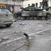 Tanks of Donetsk People's Republic militia in Mariupol, in territory under the government of the Donetsk People's Republic, eastern Ukraine, Wednesday, May 4, 2022. (AP Photo/Alexei Alexandrov)
