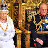 Queen Elizabeth sits with Prince Philip, Duke of Edinburgh as she delivers her speech during the State Opening of Parliament in 2004