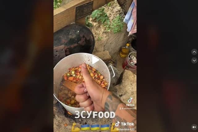 The soldier posts TikTok videos of his culinary creations in the trenches.
