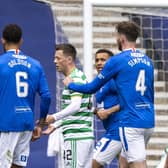 Referee Nick Walsh shows Callum McGregor a red card during a Scottish Premiership match between Rangers and Celtic at Ibrox Park, on May 02, 2021.