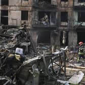 Emergency workers inspect a damaged multi-storey apartment building caused by the latest rocket Russian attack in Kryvyi Rih in Ukraine. Picture: AP Photo/Andriy Dubchak