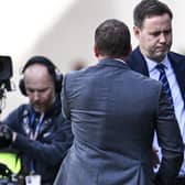 Celtic manager Brendan Rodgers shakes hands with Michael Beale after his team's 1-0 defeat of Rangers last month that the Irishman referenced in the "difficult" period that resulted in the 43-year-old losing his job. An outcome Rodgers acknowledges will be hard for his rival now, but whom he offered hope in suggesting "after the clouds comes the sunshine". (Photo by Rob Casey / SNS Group)