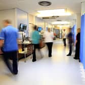 Staff on a NHS hospital ward, as nurses and midwives were forced to take more than 225,000 days off because of mental health issues in the last year
