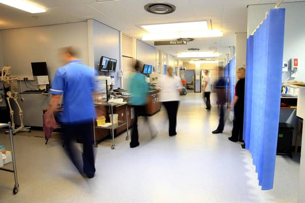 Staff on a NHS hospital ward, as nurses and midwives were forced to take more than 225,000 days off because of mental health issues in the last year