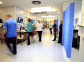 Staff on a NHS hospital ward, as nurses and midwives were forced to take more than 225,000 days off because of mental health issues in the last year