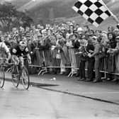 New Zealander Bruce Biddle and Australian Ray Bilney race towards the chequered flag at the finish of the 102 miles cycling road race during the Commonwealth Games in Edinburgh in July 1970. Biddle won the race.