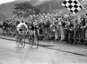 New Zealander Bruce Biddle and Australian Ray Bilney race towards the chequered flag at the finish of the 102 miles cycling road race during the Commonwealth Games in Edinburgh in July 1970. Biddle won the race.