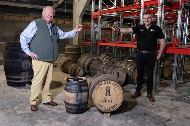 Drew McKenzie Smith, MD and Lindores Distillery Founder pictured with Gary Haggart, Distillery Manager on the maturation of the first cask of their inaugural Lindores Abbey whisky. Picture: Tina Norris
