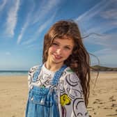 Alanna Macneil can usually be found helping on her father's croft but is also now making it big in the child modelling world with jobs for Zara, Mango and River Island among her recent assignments. PIC: BBC ALBA.