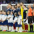 Scotland sing their national anthem during the 150th Anniversary Heritage Match between Scotland and England at Hampden Park, on September 12, 2023, in Glasgow, Scotland.