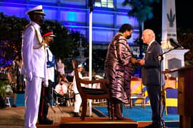 TOPSHOT - Charles, Prince of Wales (R) receives the Order of Freedom of Barbados from President of Barbados Dame Sandra Mason (2nd R) during the ceremony to declare Barbados a Republic and the Inauguration of the President of Barbados at Heroes Square in Bridgetown, Barbados, on November 30, 2021. - Fireworks filled the sky over Barbados as the Caribbean island nation declared itself the world's newest republic, lowering Queen Elizabeth's flag as it severed colonial-era ties to the British throne to the sound of jubilant gun salutes. (Photo by Randy Brooks / AFP) (Photo by RANDY BROOKS/AFP via Getty Images)