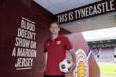Kye Rowles will be in the centre of Hearts' defence for the visit of Hibs this weekend.