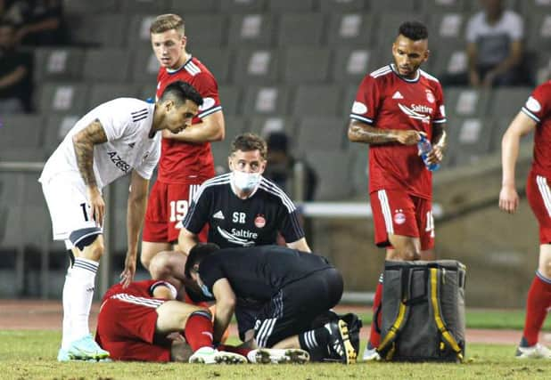 Andy Considine underwent surgery this week after his injury at the Tofiq Bahramov Republican Stadium, on August 19, 2021, in Baku, Azerbaijan. (Photo by Ehtiram Jabi / SNS Group)