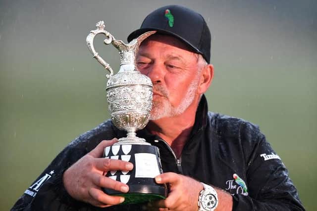 Darren Clarke kisses the trophy after winning The Senior Open Presented by Rolex at Gleneagles. PIcture: Mark Runnacles/Getty Images.