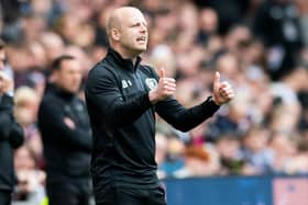 Steven Naismith gives the thumbs-up to Hearts after overseeing the 6-1 win over Ross County.