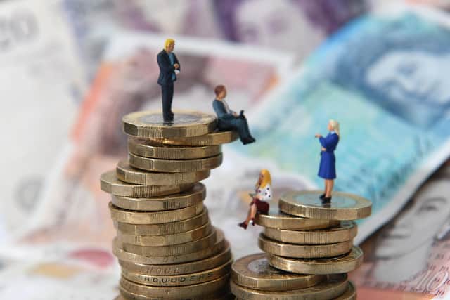 Research has shown that the average earnings of female workers in Aberdeen and Glasgow are considerably lower than those of their male peers. Picture: PA.