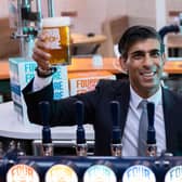 Chancellor Rishi Sunak's cuts to beer and cider duty can't hide the fact that the tax burden is rising to historic levels (Picture: Dan Kitwood/pool/AFP via Getty Images)