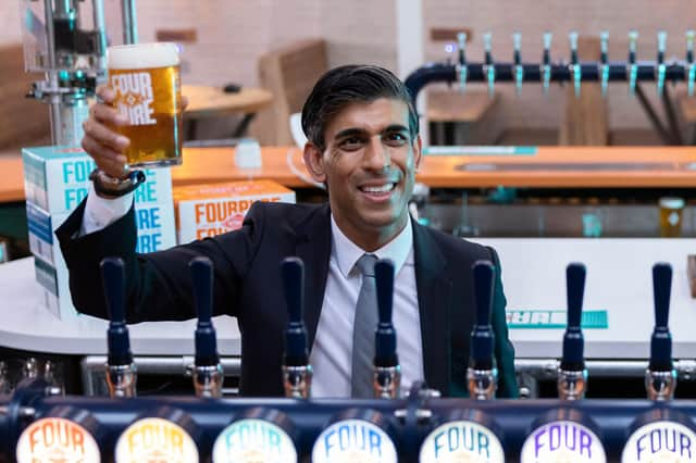 Chancellor Rishi Sunak's cuts to beer and cider duty can't hide the fact that the tax burden is rising to historic levels (Picture: Dan Kitwood/pool/AFP via Getty Images)