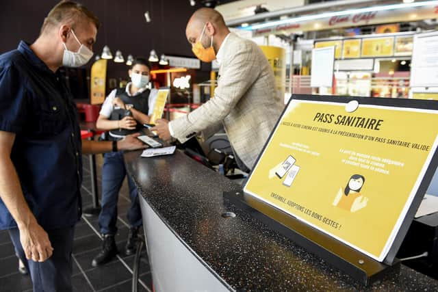 French cinemas, museums and sports venues began asking visitors to furnish proof of Covid-19 vaccination or a negative test in July. Photo by JEAN-CHRISTOPHE VERHAEGEN/AFP via Getty Images