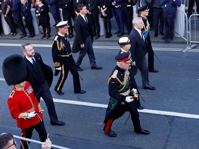 King Charles III, the Princess Royal, the Duke of York and the Earl of Wessex walk behind Queen Elizabeth II's coffin during the procession from the Palace of Holyroodhouse to St Giles' Cathedral, Edinburgh. Picture date: Monday September 12, 2022.