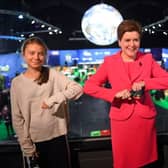 Nicola Sturgeon had her picture taken with climate activists Greta Thunberg (left) and Vanessa Nakate at COP26 last year (Picture: Andy Buchanan/Pool/Getty Images)