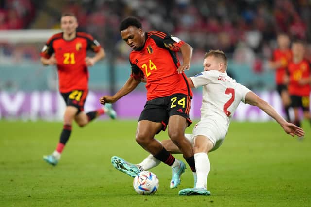 Canada's Alistair Johnston (right) and Belgium's Lois Openda battle for the ball during the FIFA World Cup Group F match at the Ahmad bin Ali Stadium, Al Rayyan. Picture date: Wednesday November 23, 2022.