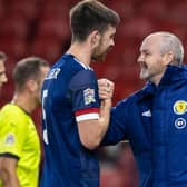 Declan Gallagher is congratulated by Scotland manager Steve Clarke (right)  after helping the country to a third consecutive clean sheet in last month's 1-0 win over the Czech Republic (Photo by Craig Williamson / SNS Group)