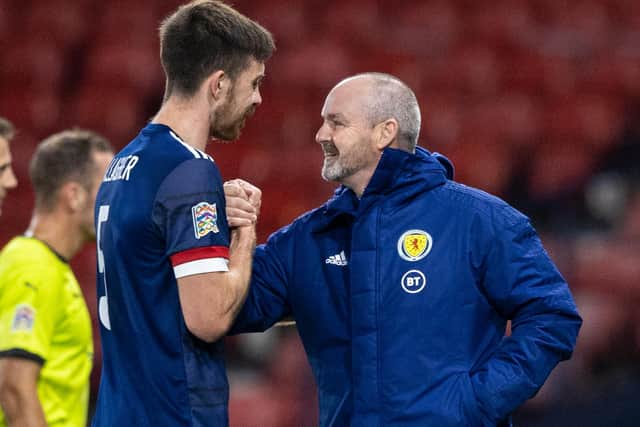 Declan Gallagher is congratulated by Scotland manager Steve Clarke (right)  after helping the country to a third consecutive clean sheet in last month's 1-0 win over the Czech Republic (Photo by Craig Williamson / SNS Group)