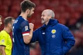 Declan Gallagher is congratulated by Scotland manager Steve Clarke (right)  after helping the country to a third consecutive clean sheet in last month's 1-0 win over the Czech Republic (Photo by Craig Williamson / SNS Group)