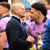 Scotland head coach Gregor Townsend (L) shakes the hand of Scotland's centre Sione Tuipulotu after the Six Nations international rugby union match between Scotland and Italy at Murrayfield Stadium.
