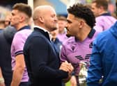 Scotland head coach Gregor Townsend (L) shakes the hand of Scotland's centre Sione Tuipulotu after the Six Nations international rugby union match between Scotland and Italy at Murrayfield Stadium.