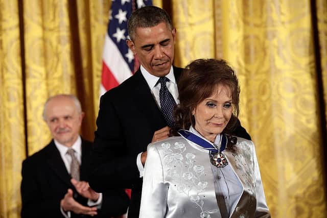 President Barack Obama awards Loretta Lynn the Presidential Medal of Freedom at the White House in 2013 (Picture: Win McNamee/Getty Images)