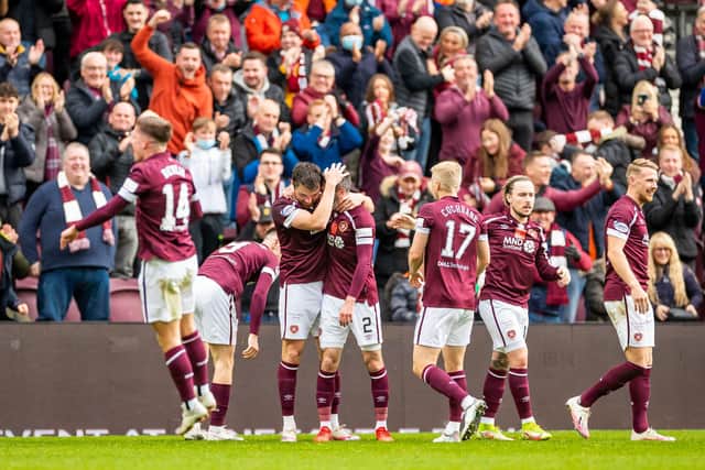The Hearts players celebrate John Souttar's opening goal against Dundee.
