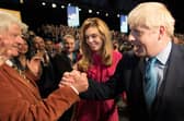 Boris Johnson is congratulated by his father Stanley Johnson after delivering his keynote speech on the final day of the annual Conservative Party conference in Manchester in 2019 (Picture: Stefan Rousseau/pool/AFP via Getty Images)