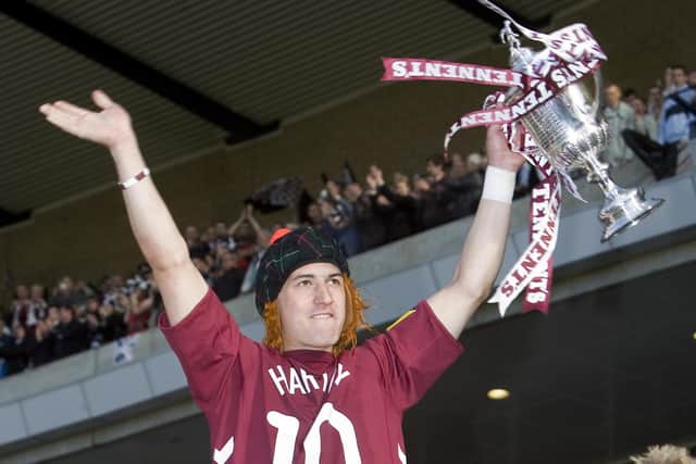 Rudi Skacel, wearing team-mate Paul Hartley's jersey, celebrates Hearts' Scottish Cup final win over Gretna in 2006. Blair Kinghorn and his father were among the fans cheering on the Gorgie club at Hampden.  (Picture: Bill Murray/SNS)