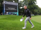 Luke Donald leaves the 18th green on Thursday night following the announcement of the death of Her Majesty Queen Elizabeth II during day one of the BMW PGA Championship. Picture: Warren Little/Getty Images.
