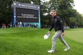 Luke Donald leaves the 18th green on Thursday night following the announcement of the death of Her Majesty Queen Elizabeth II during day one of the BMW PGA Championship. Picture: Warren Little/Getty Images.