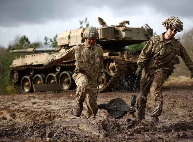 Soldiers take part in a military exercise at the Longmoor training area, Hampshire, in March (Picture: Adrian Dennis/AFP via Getty Images)