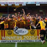 Partick Thistle players celebrate winning the Scottish league one title at Firhill . (Photo by Craig Foy / SNS Group)